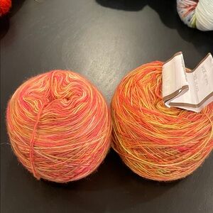 Uknitted nations 100% merino wool lace weight yarn